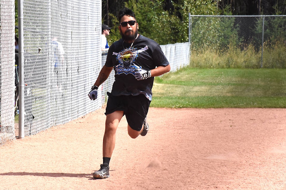 Dylan Dick of Ole School runs for home in a game against the Broke Millionaires. (Angie Mindus photo - Williams Lake Tribune)