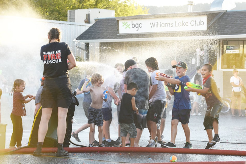 A water fight between young people and first responders is always a highlight of the BGC Street Party. (Ruth Lloyd photo - Efteen)