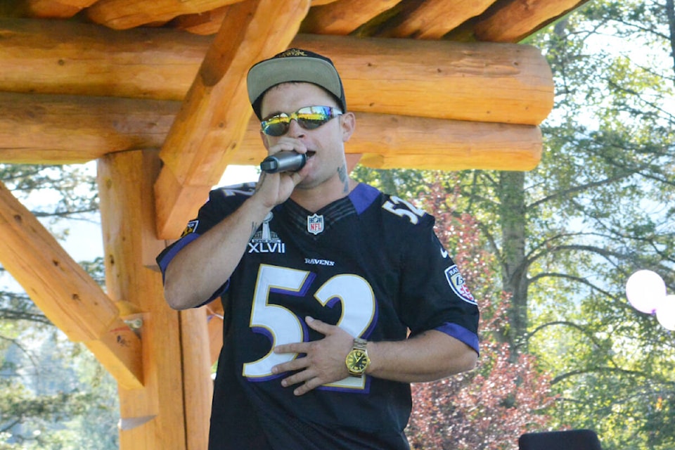 Williams Lake rapper Bryan Bioson performs a song about addiction during the Overdose Awareness Day event held at Boitanio Park on Wednesday, Aug. 31. (Monica Lamb-Yorski photo - Williams Lake Tribune)