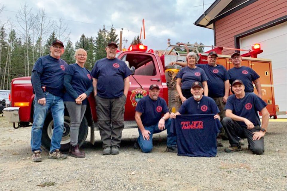 Tyee Lake Volunteer Fire Department members (left to right standing) Rick Rhodes, Lorrie Rhodes, Tony Clark, Cheryl Lawrence, Derek Beaulieu and Chris Lawrence, kneeling Larry Straza, Fire Chief Rick Jelley and Graham Smith. Missing are Dale Gray, Mike Foote and Robin Storoschuk outside the fire hall which also serves as a community hall. (Photo submitted)