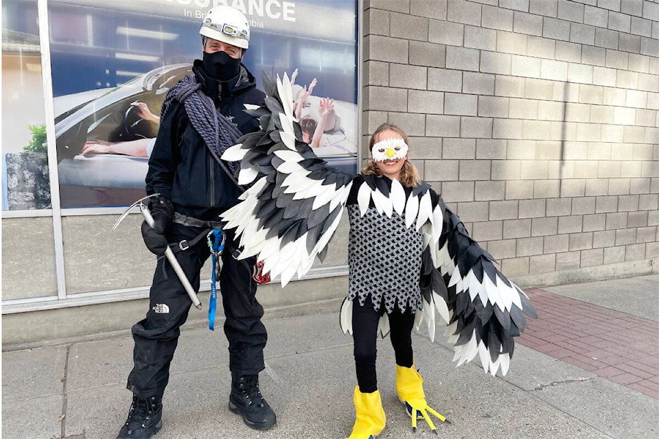 Mountaineer Cameron Self and this eagle, otherwise known as Paolo Roland Self, were spotted out on the streets of Williams Lake during the Downtown Williams Lake Trick ‘r Treat event. (Ruth Lloyd photo - Williams Lake Tribune)
