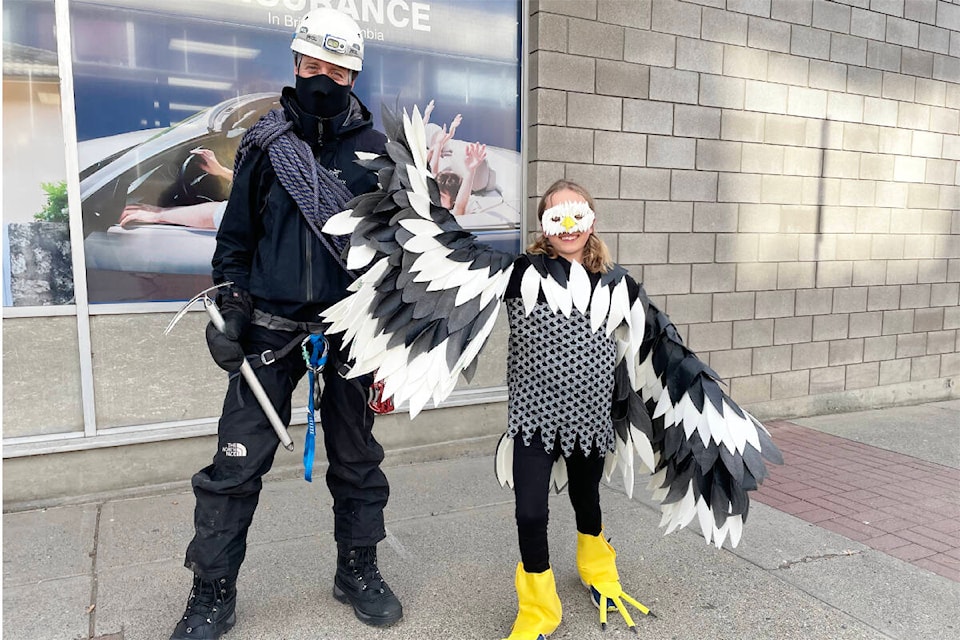 Mountaineer Cameron Self and this eagle, otherwise known as Paolo Roland Self, were spotted out on the streets of Williams Lake during the Downtown Williams Lake Trick ‘r Treat event. (Ruth Lloyd photo - Efteen)