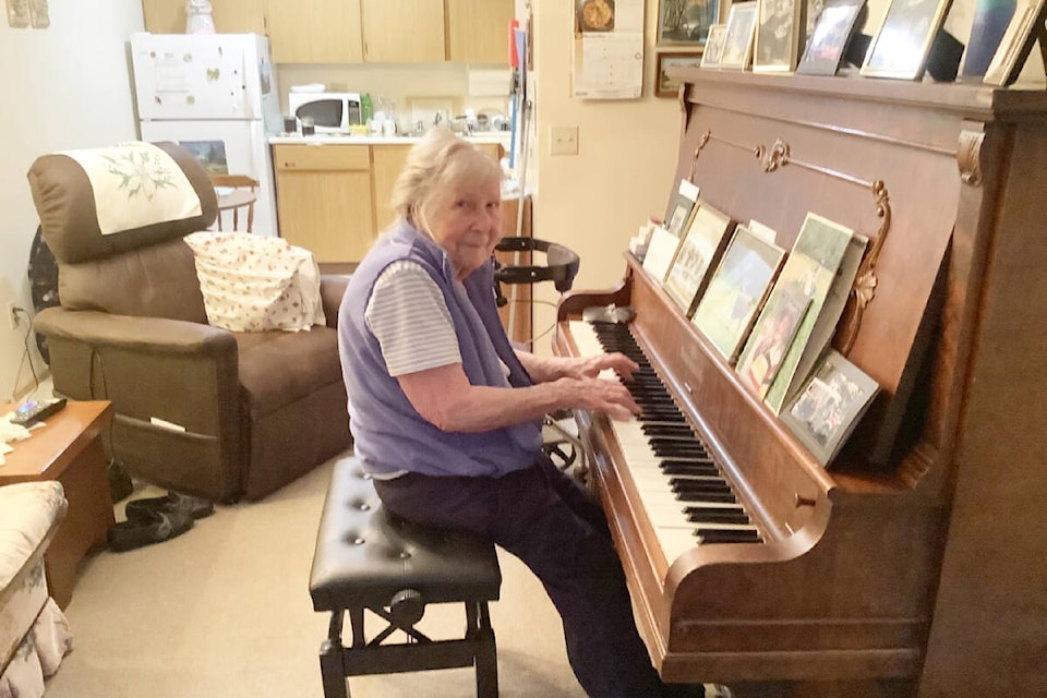 Bella Coola resident Lorena Draney, 102, plays the piano almost every day. (Elaine McLean photo)