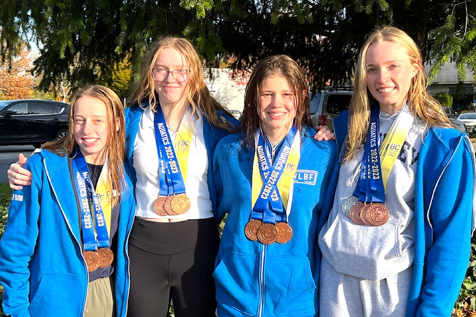 Williams Lake Blue Fins Rebecca Elefson (from left), Rowan Smith, Braedi Hamar and Morgan Langford came home from high school provincials representing Lake City Falcons with three bronze medals in the relays (400 Free, 200 Medley and 200 Free relays). Morgan added an individual silver in the 100 Backstroke. The competitors finished 11th place overall with only four girls at the competition.(Photo submitted)
