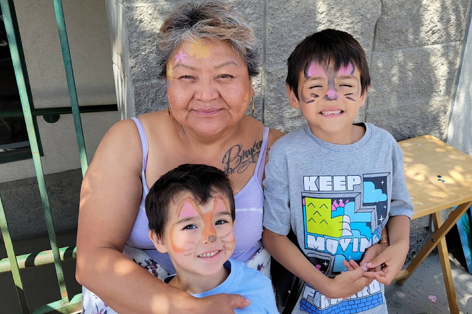 Lori George and two of her grandsons. George is raising three grandsons who are the children of her daughter Candice, who passed away after using toxic drugs in November. (Photo courtesy of Lori George)
