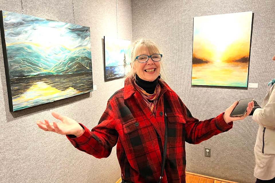 Bella Coola artist Ida Eriksen attends the opening for her solo show Feb. 9 titled West Coast Light currently on display at the Station House Gallery. (Angie Mindus photo - Williams Lake photo)