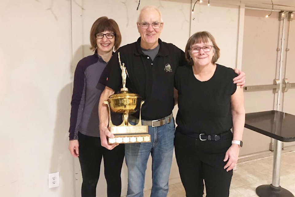 Dryden team were the Mixed League “A” Division winners for the season. Holding their trophy are Irene Laffer, from left, John Dryden, and Betty Dryden, plus Konrad Laffer, not in photo. (Photo submitted)