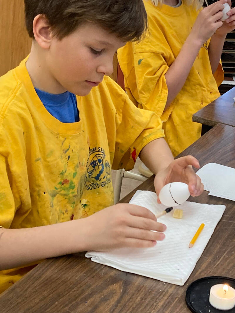 32368818_web1_230409-WLT-EasterEggmaking-TatlaSchool-_1