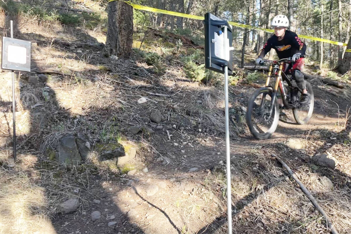 Maddex Cullum heads for the finish gates as he completes a run down the course for the Sunset DH Series mountain bike race. (Ruth Lloyd photo - Efteen)