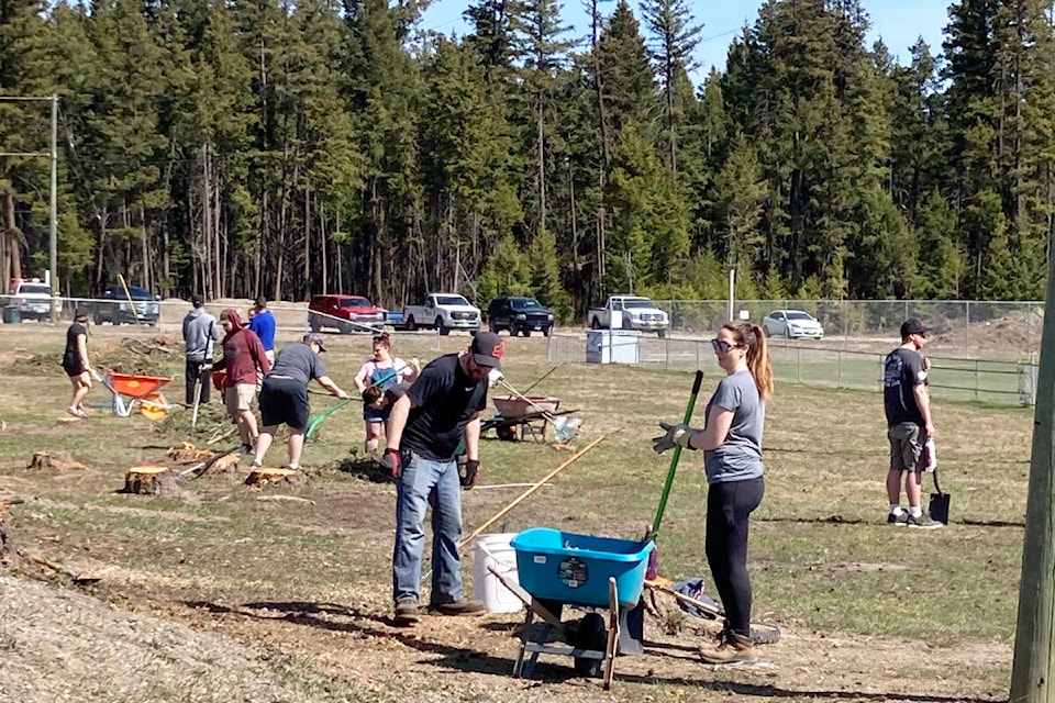 Volunteers prep the Esler Sports Complex for the upcoming Williams Lake Slo-Pitch League season ahead. (Photo submitted)