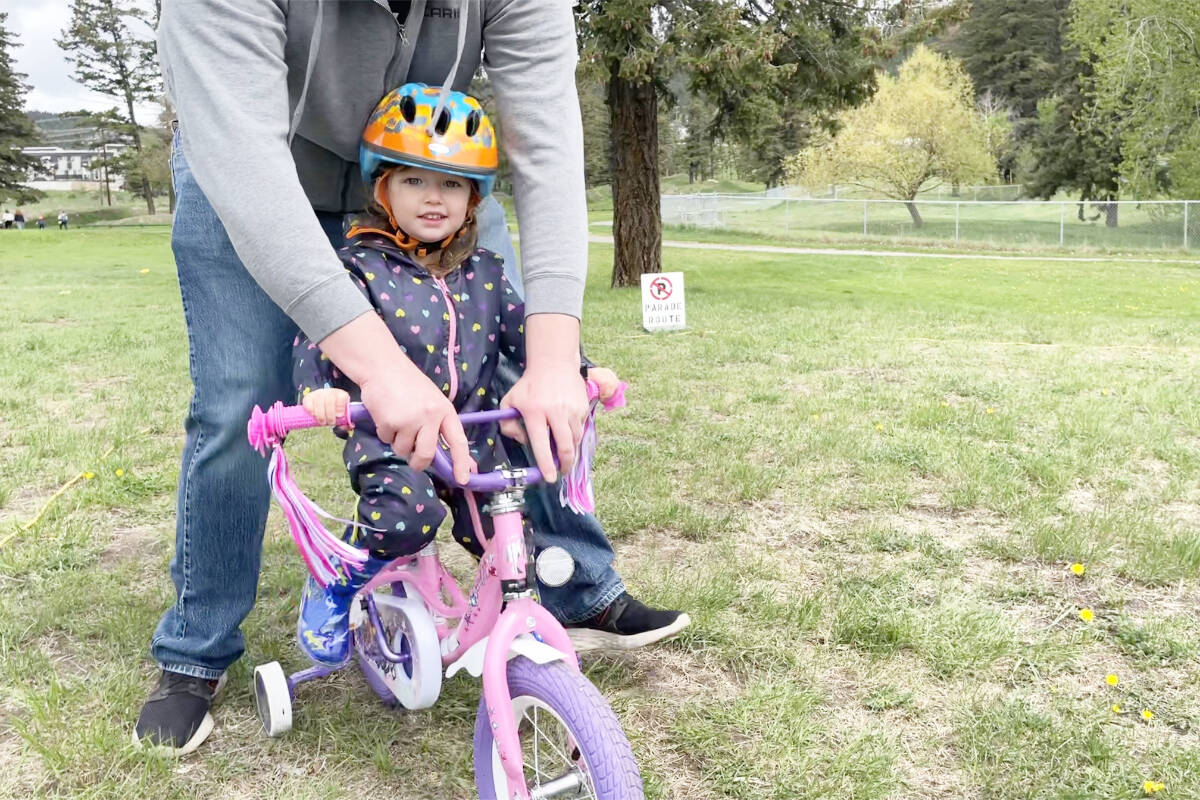One of the younger riders at the bike rodeo looks to be enjoying herself on the obstacle course portion of the bike rodeo hosted by Streets for All Williams Lake. (Ruth Lloyd photo - Efteen)