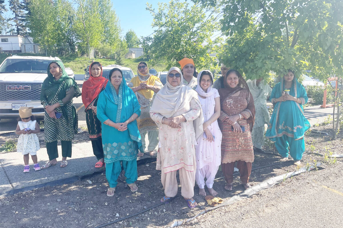 Community members watching the flagpole ceremony were packed into patches of shade during Vaisakhi celebrations at Gurdwara Sahib Western Singh Sabha Association on May 13, 2023. (Ruth Lloyd photo Efteen)