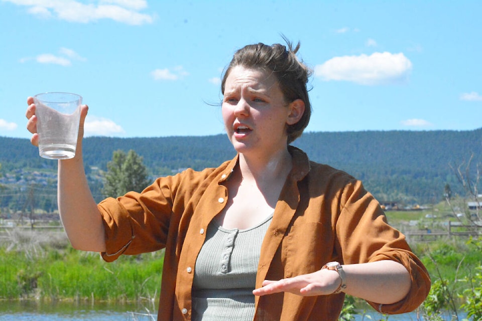 Adriene Zimmerman, a university student leader talks about salmon at Scout Island on Sunday, June 11 before children released salmon into the Williams Lake Creek. (Monica Lamb-Yorski photo - Efteen)