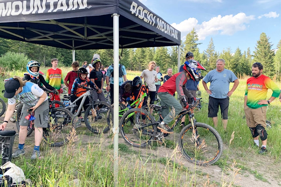 A rider takes off at the top for the race down Aflo in the final of the four-race Sunset DH Series. (Beverly Rooke Photo)
