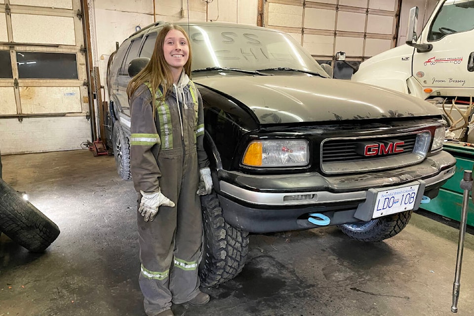 Chelsea Lewis stands next to her beloved Jimmy “Cricket” which she worked on herself, along with her dad Mike Lewis. (Photo submitted)