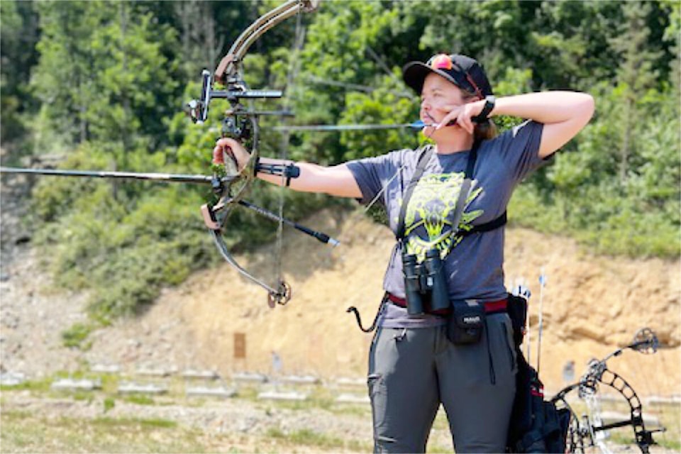 Cara Fraser at a shoot in Abbotsford July 8, 9 takes aim. (Photo submitted)
