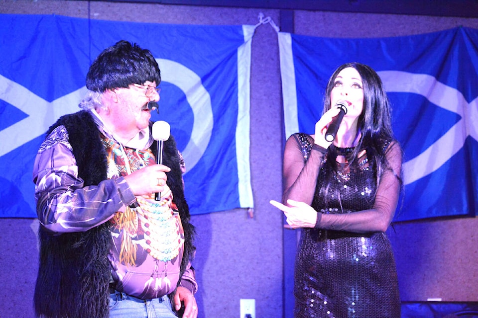 Wayne Lucier, left, participates as Sonny with Bonnie Kilroe’s Cher during Kilroe’s Divas Show at the McLeese Lake Hall Saturday, July 29 during the Métis Jamboree. (Monica Lamb-Yorski photo - Efteen)