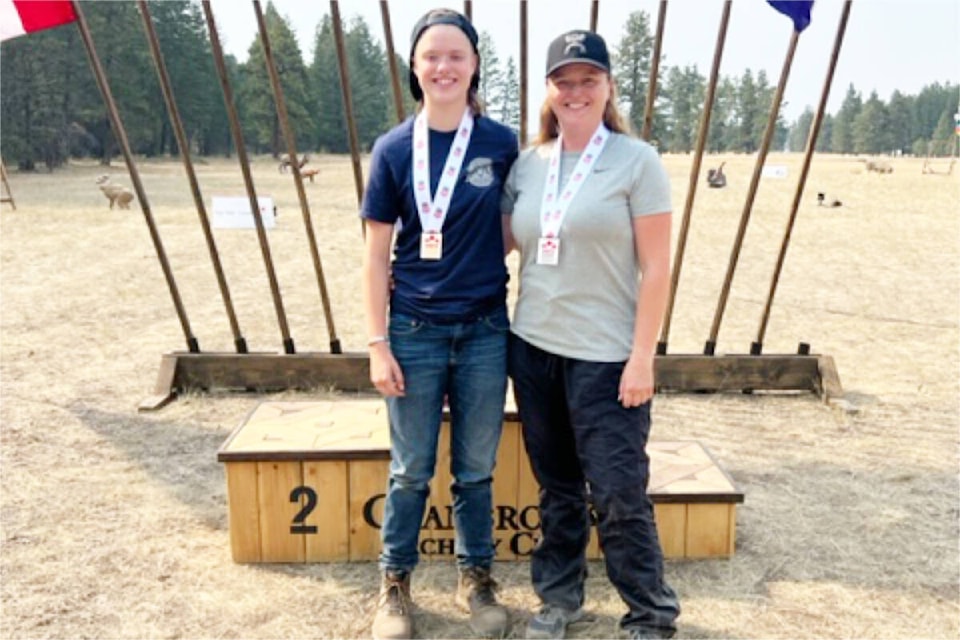 Lily Fraser, left, and Cara Fraser pose with their medals. (Al Campsall photo)