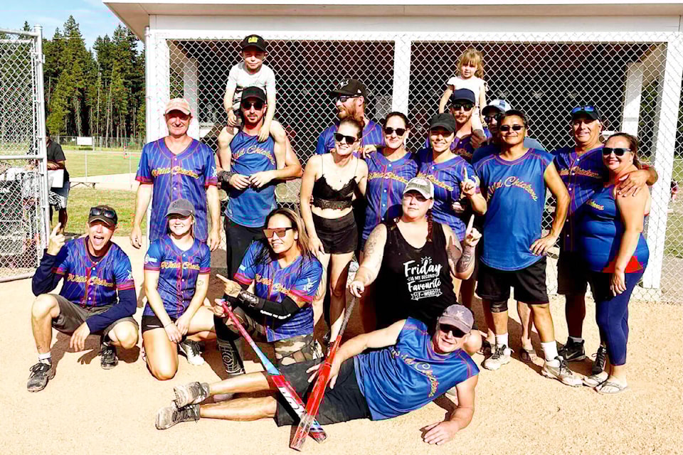 The Wild Chickens slo-pitch team were the B division champions in the Williams Lake Slo-Pitch Year-End Tournament. Mason and Lynnea Leah, back row on shoulders. Daryl Taylor, next row from left, Collin Leah, Kiel Bouchard, Josh Duncan and hidden is Shaun Morphet. Middle row standing are Cindie Walsh, Amy Morphet, Nicole Leah, Vince Noskey, Pete Bowman and Michelle Noskey. Darron Campbell, front row from left, Kalli Campbell, Rachel Lyric and Dez Wycotte. Shawn Lewis in front. (Photo submitted)