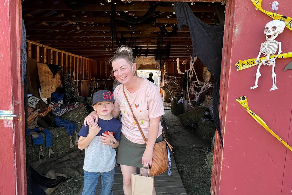 Breanne and Owen Donaldson check out the haunted barn at the 44th Annual Harvest Fair where the theme was Halloween in September. (Angie Mindus photo - Efteen)