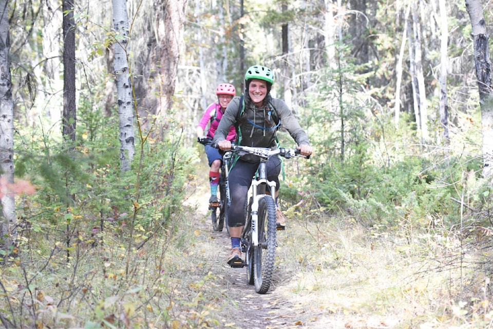Shannon O’Donovan, front, and Bev Rooke, complete a lap of the Pedal by the Puddle course on Sept. 23, 2023. (Ruth Lloyd photo - Efteen)
