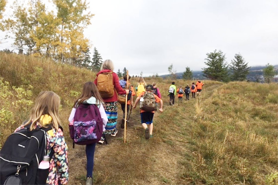 Chilcotin Road Elementary students, along with some staff and parents, walked from the school down to the Williams Lake Stampede Grounds as part of their Orange Shirt Day activities. (Jane Wellburn photo)