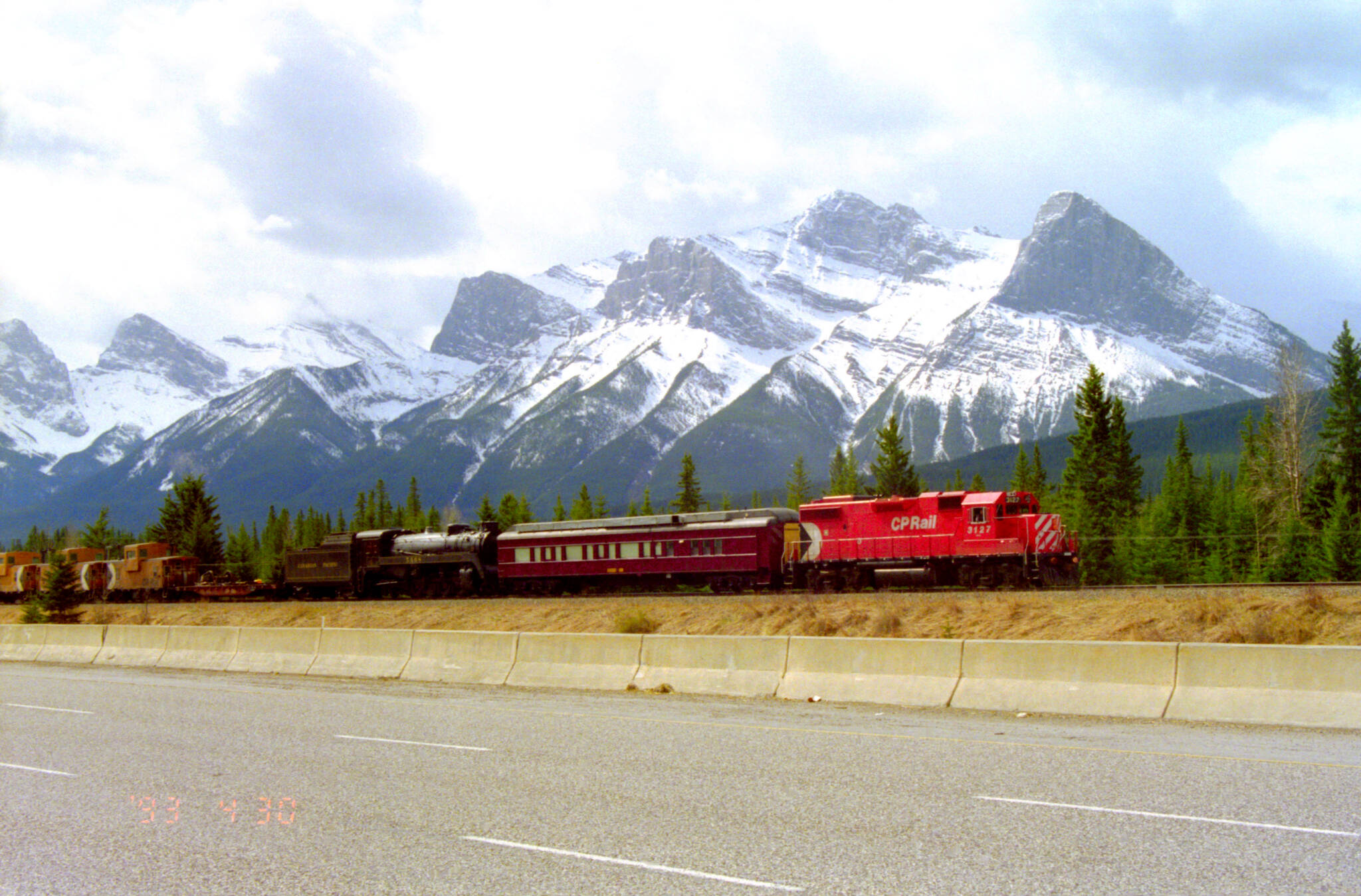 The special train with 5468 passes Canmore, Alta. en route to Revelstoke, B.C. (Revelstoke Railway Museum Collection)