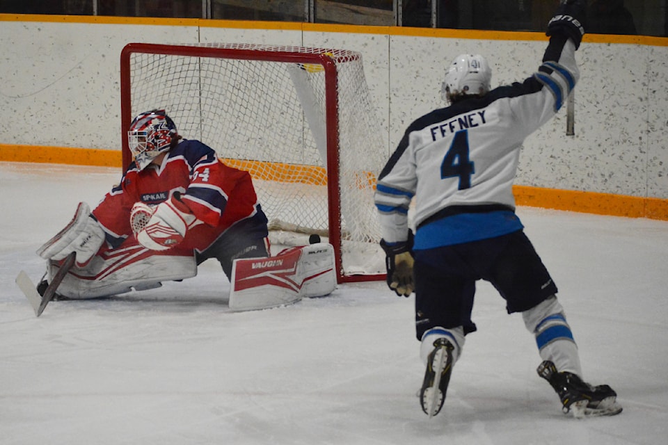 Williams Lake Mustangs player Garrett Feeney gets the team's second goal during the second period in a game against the Spokane Chiefs, Saturday Nov. 9 in Williams Lake. 
