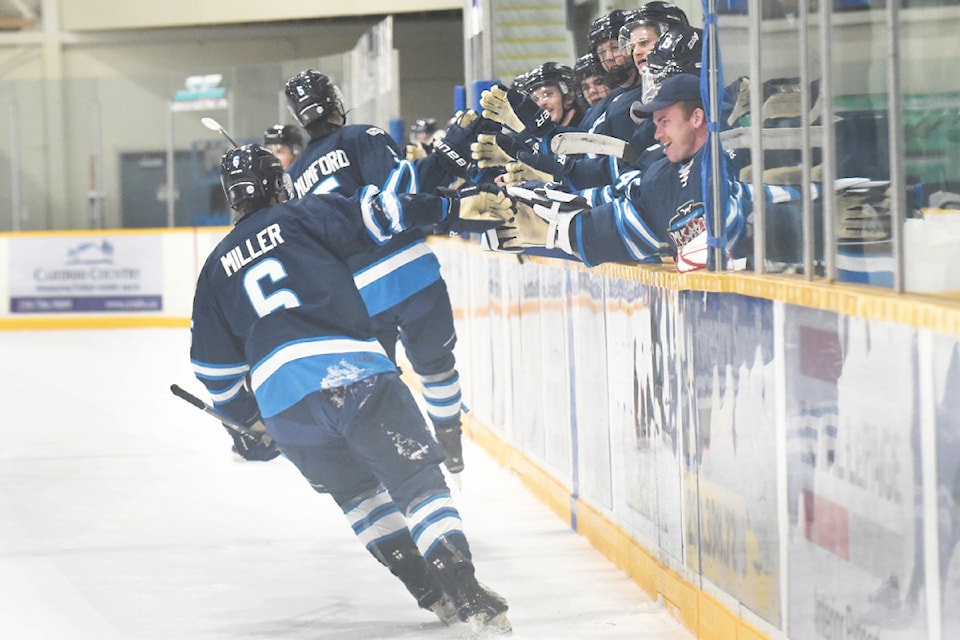 Mustangs celebrate one of five goals they scored against the Sicamous Eagles on home ice in their season opener Sept. 20.