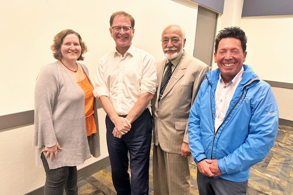 Coun. Sheila Boehm (from left), Hon. Adrian Dix, Mayor Surinderpal Rathor, and Coun. Scott Nelson meet at UBCM this week. 