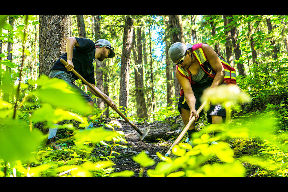 Working on trails helps build community while also reconnecting people to the land.