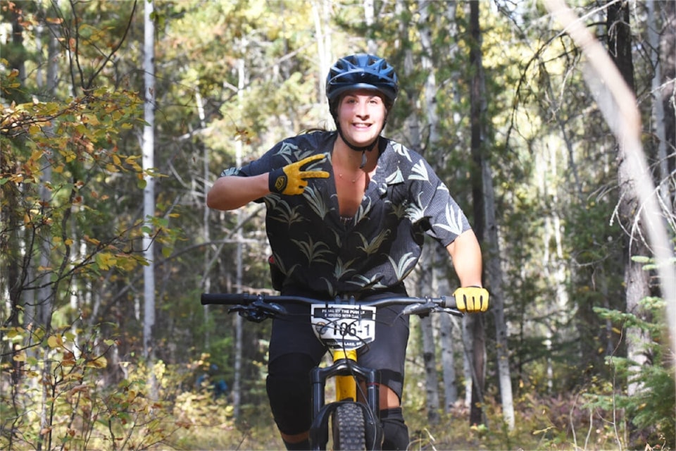 Alex Neumann looks relaxed on a lap of the 2023 Pedal by the Puddle enduro mountain bike event. 