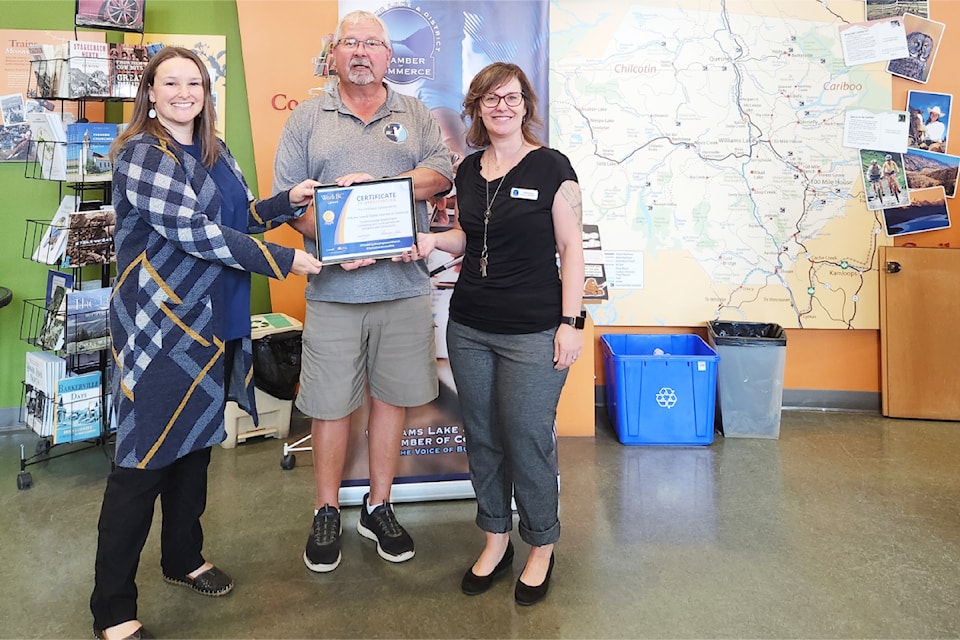 Shannon Thom of Work BC (from left), presents Paul French, president of Williams Lake & District Chamber of Commerce (WLDCC), and Tamara Garreau, WL DCC executive director, with a certificate.
