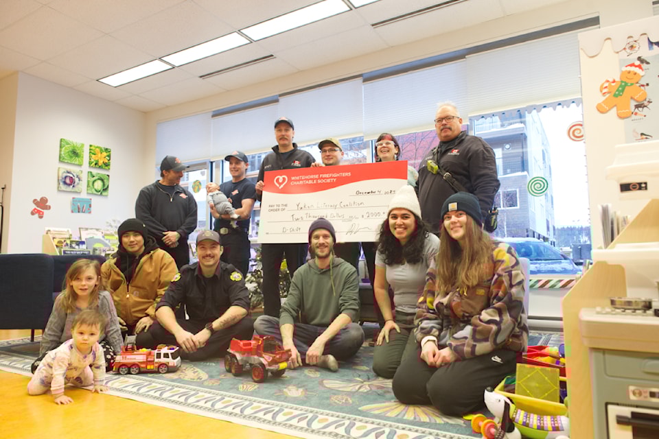 241204-ykn-news-literacy-coalition-cheque