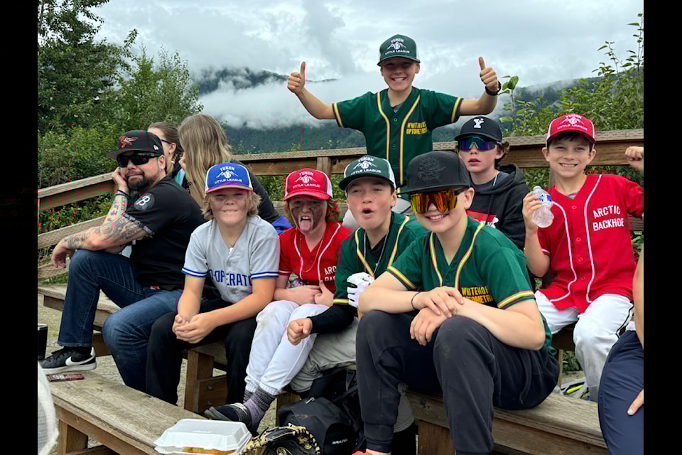 Triumphant baseball players celebrating a well-earned victory in Haines, Alaska. (Sara Skelton/Submitted)