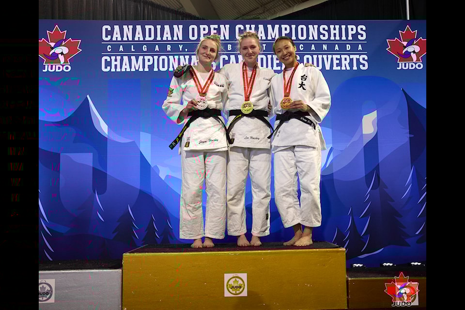 Jaymi Hinchey, left, and Lia Hinchey, right, earned silver and gold respectively in the ne-waza under-63 kilogram division at the 2025 Open National Championships on May 15, 2025. (Tonja Hinchey/Submitted)