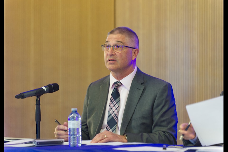 Yukon Workers' Safety and Compensation Board president and CEO Kurt Dieckmann speaks during the board's annual general meeting, held in Whitehorse on Sept. 11, 2024. 