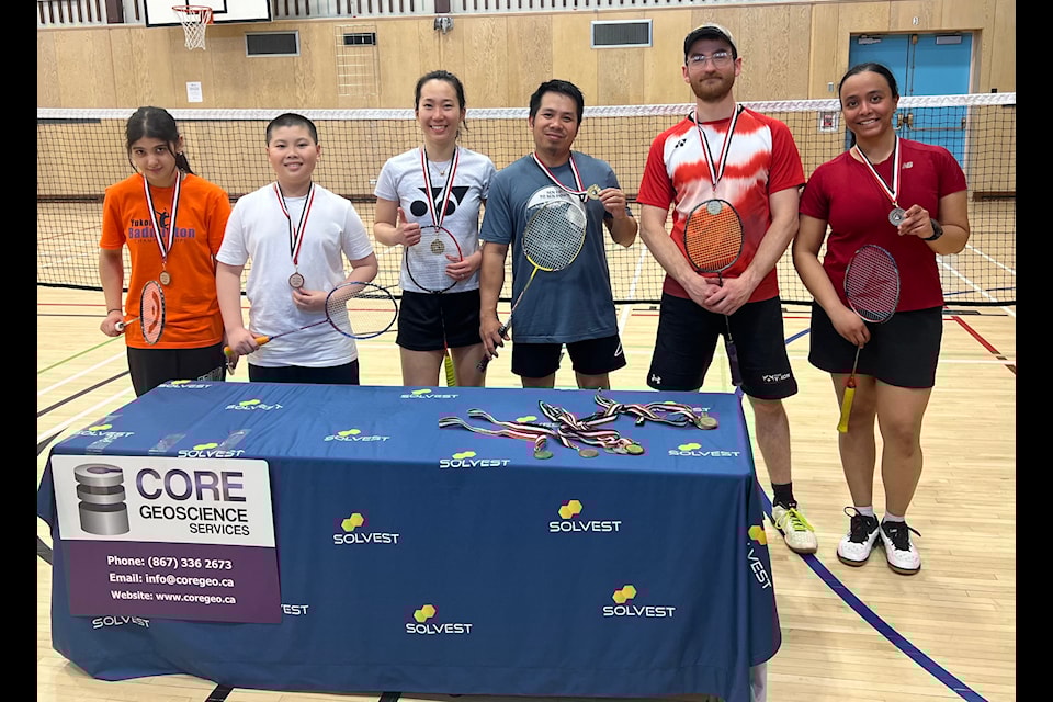 From left to right, Tashvi Bhatia, Khoi Tran, Skyler Liang and Angus Harden are pictured after winning gold at the Yukon Badminton Championships, held from April 26-27. (Alain Dallaire/Submitted)