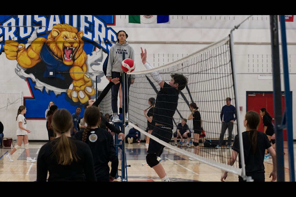 Team Freezies plays Team Blizzards during the 13/14 and under jamboree tournament at the St. Francis of Assisi gym on Feb. 8