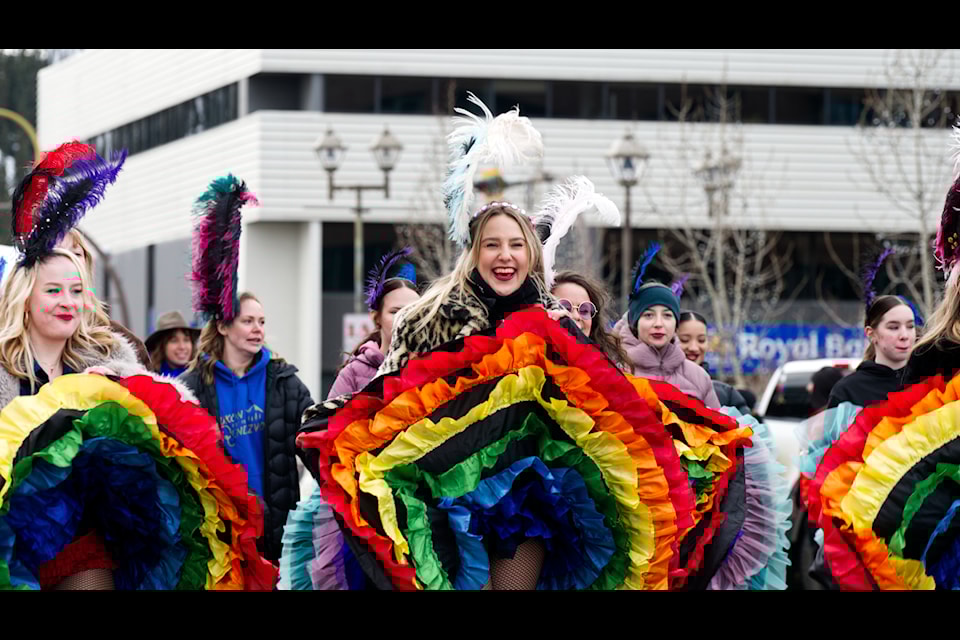 Cancan dancers lead the Rendezvous parade down Main Street in Whitehorse on Feb. 23.