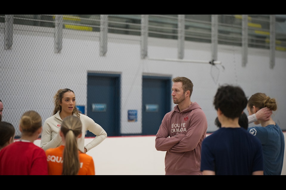 Canadian Olympians Brandie Wilkerson, left, and  Sam Schachter work with Yukon beach volleyball athletes at the Canada Games Centre in Whitehorse on Jan. 3. 