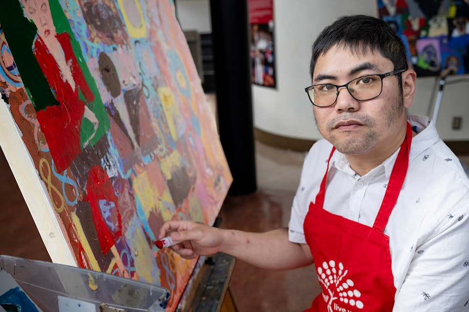 Artist Ernest Chua led a painting workshop at the Yukon Arts Centre on June 25. (Mike Thomas/Yukon Arts Centre)