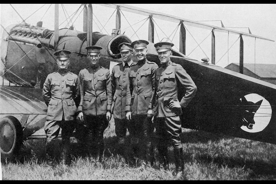 Several of the members of the Black Wolf Squadron with one of their planse. From L to R: Captain St. Clair Streett, 1st Lieutenant Clifford C. Nutt, 2nd Lieutenant R. C. Kirkpatrick, 2nd Lieutenant Eric Nelson, and 2nd Lieutenant C.H. Crumrine. (Gates Collection)