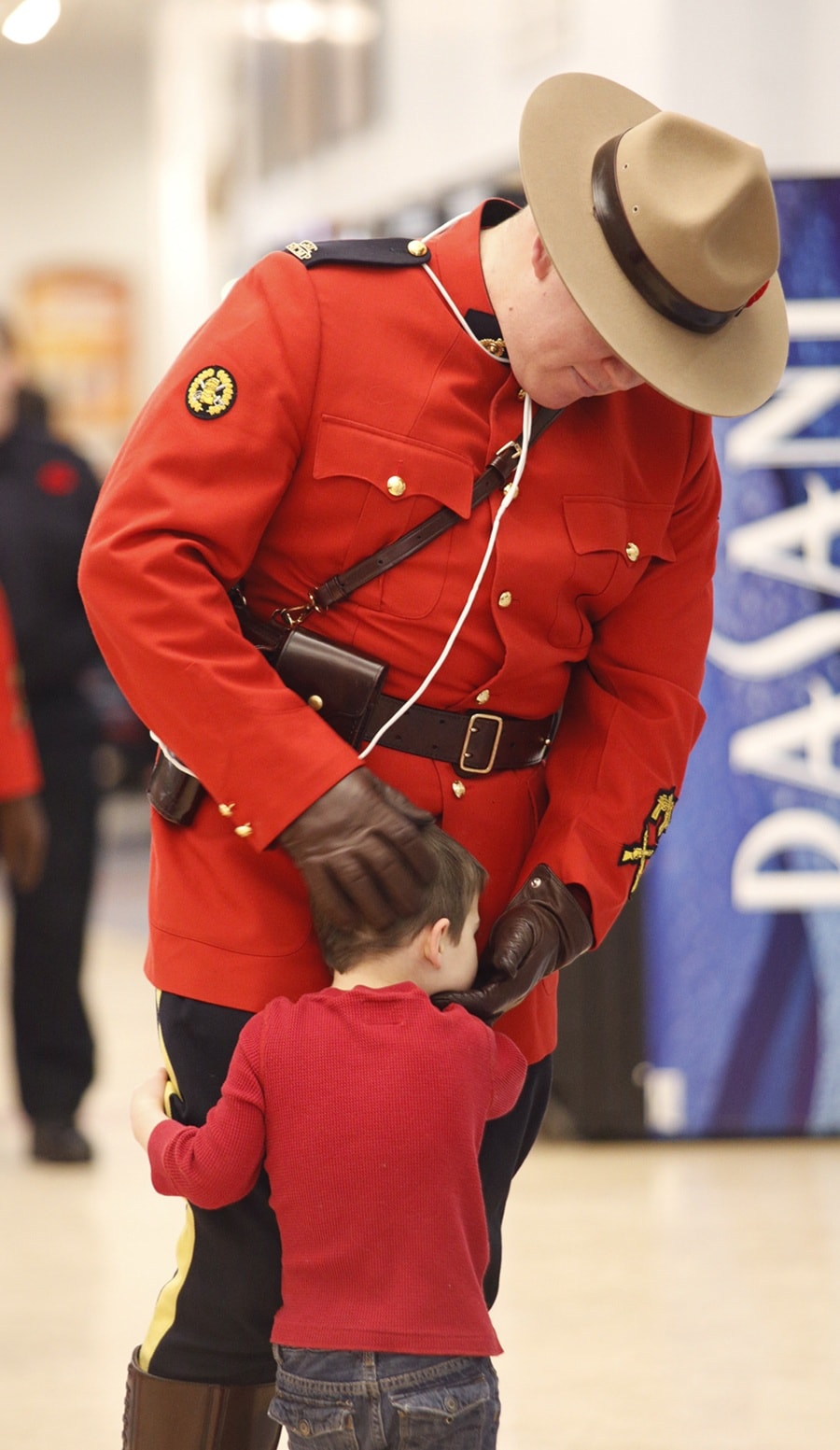 Joel Krahn/Yukon News
Constable Jeff Reid gets a hug from his son Erik.