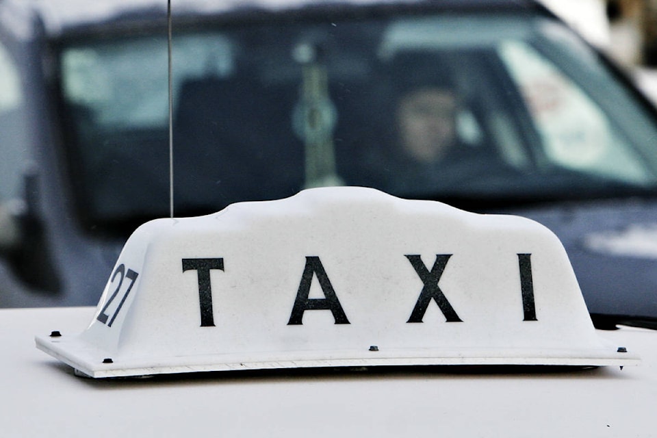 9820787_web1_021710-taxi_Web