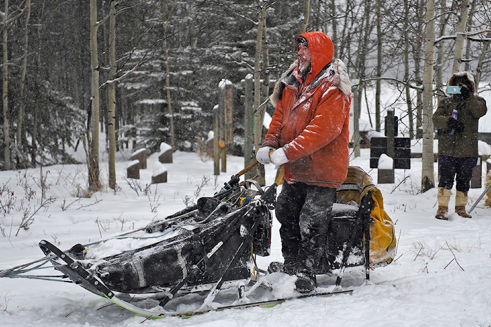 Brent Sass parks his team after being the first musher to arrive at the Braeburn checkpoint on Feb. 10 during the 2020 Yukon Quest. Sass and his team arrived at 3:37 p.m. for their mandatory eight-hour layover before continuing the final 160 kilometres to the finish in Whitehorse. (John Hopkins-Hill/Yukon News)