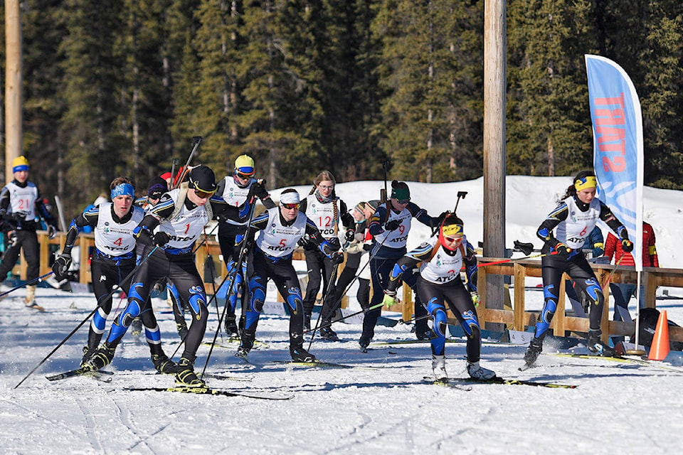 Biathletes begin a mass-start race during the Yukon Championships on March 1 at the Grey Mountain Biathlon Range. (John Hopkins-Hill/Yukon News)