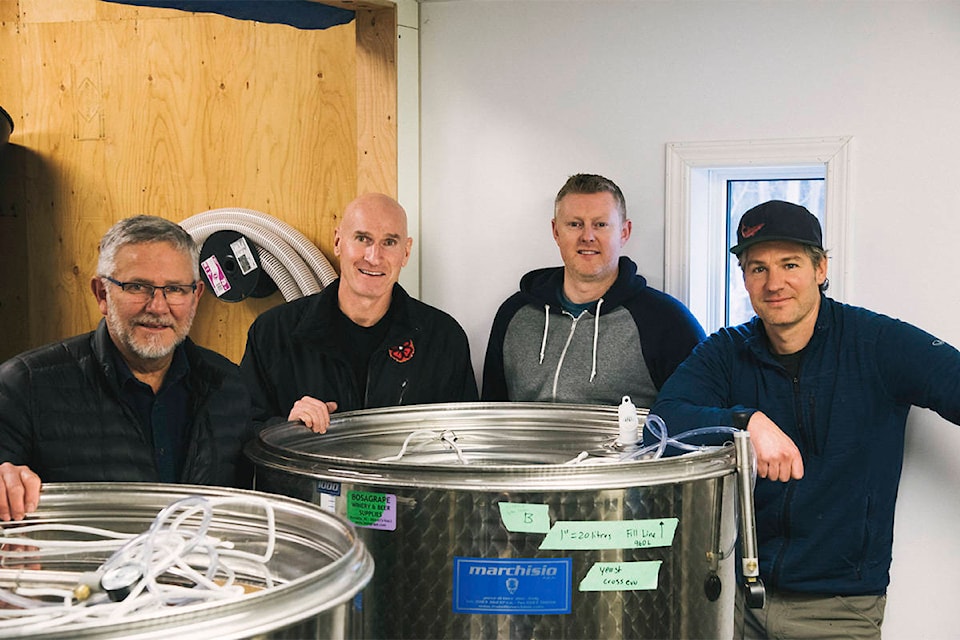 Yukon Wines owners Harold Roche, from left, Stephen Mooney, Colin Nickerson and Kyle Marchuk pose for a photo at the winery in November 2019. (Erik Pinkerton/Submitted)