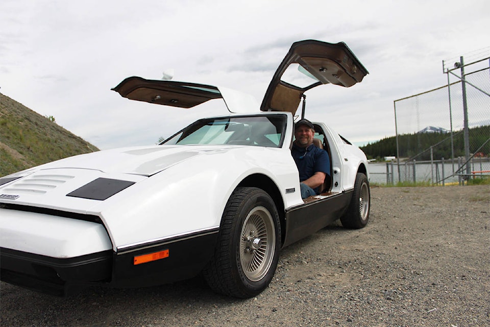 Murray Arsenault sits in the drivers seat of his 1975 Bricklin SV1 in Whitehorse on June 16. (Stephanie Waddell/Yukon News)