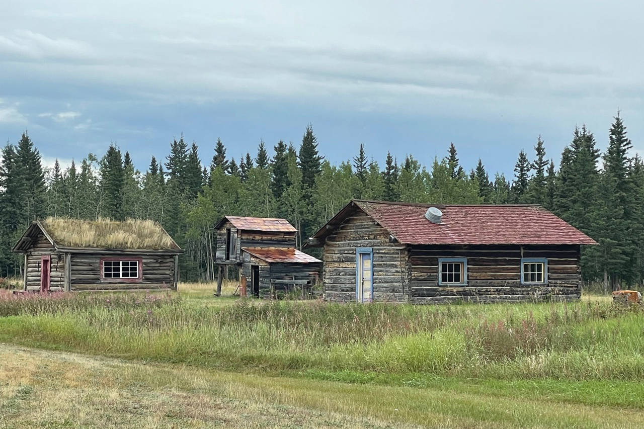 Buildings show a variety of construction methods and roofing. Also shown are high and low cache buildings for food storage. Lawrie Crawford/Yukon News photo